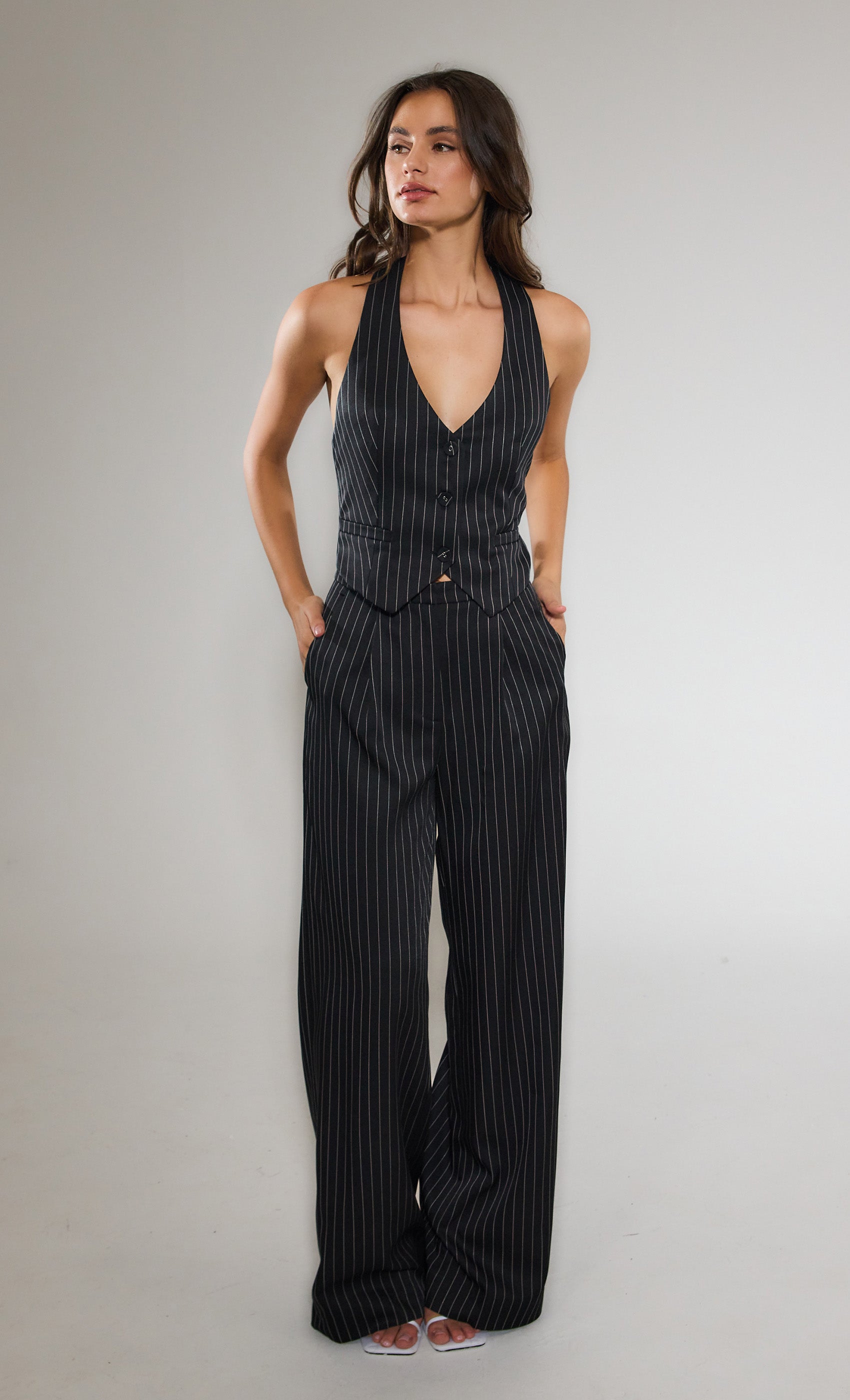 Striped black jumpsuit on sale